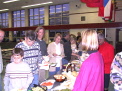 Coach Shaklee, parents and athletes at the buffet table