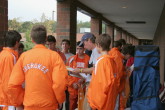 Coach Shaklee does paperwork in the only shelter available