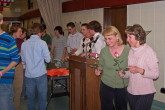 Athletes prepare flowers for presentation to parents