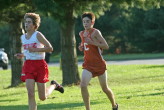 East's Berger and Steve Burkholder near the finish