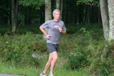Coach Shaklee checks things out by the pond