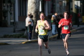 Alex Yersak dogs Bernie Muller of Bryn Mawr College
