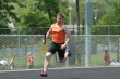 Kevin Merrigan starts the 4 X 400m Relay