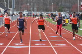 Varsity 100m Dash finish